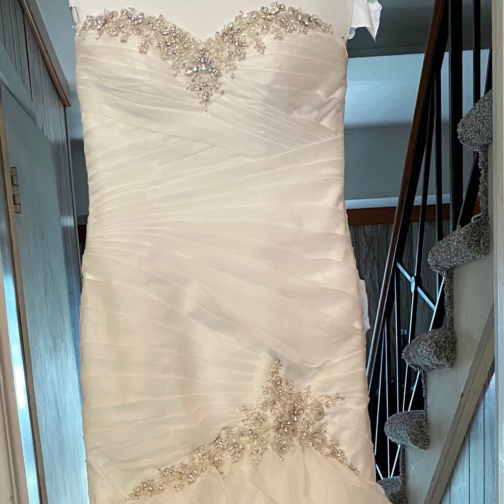 White wedding dress size 12 with embellished sweetheart neckline and waist.